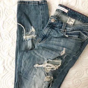 Distressed Mid Rise Jeans